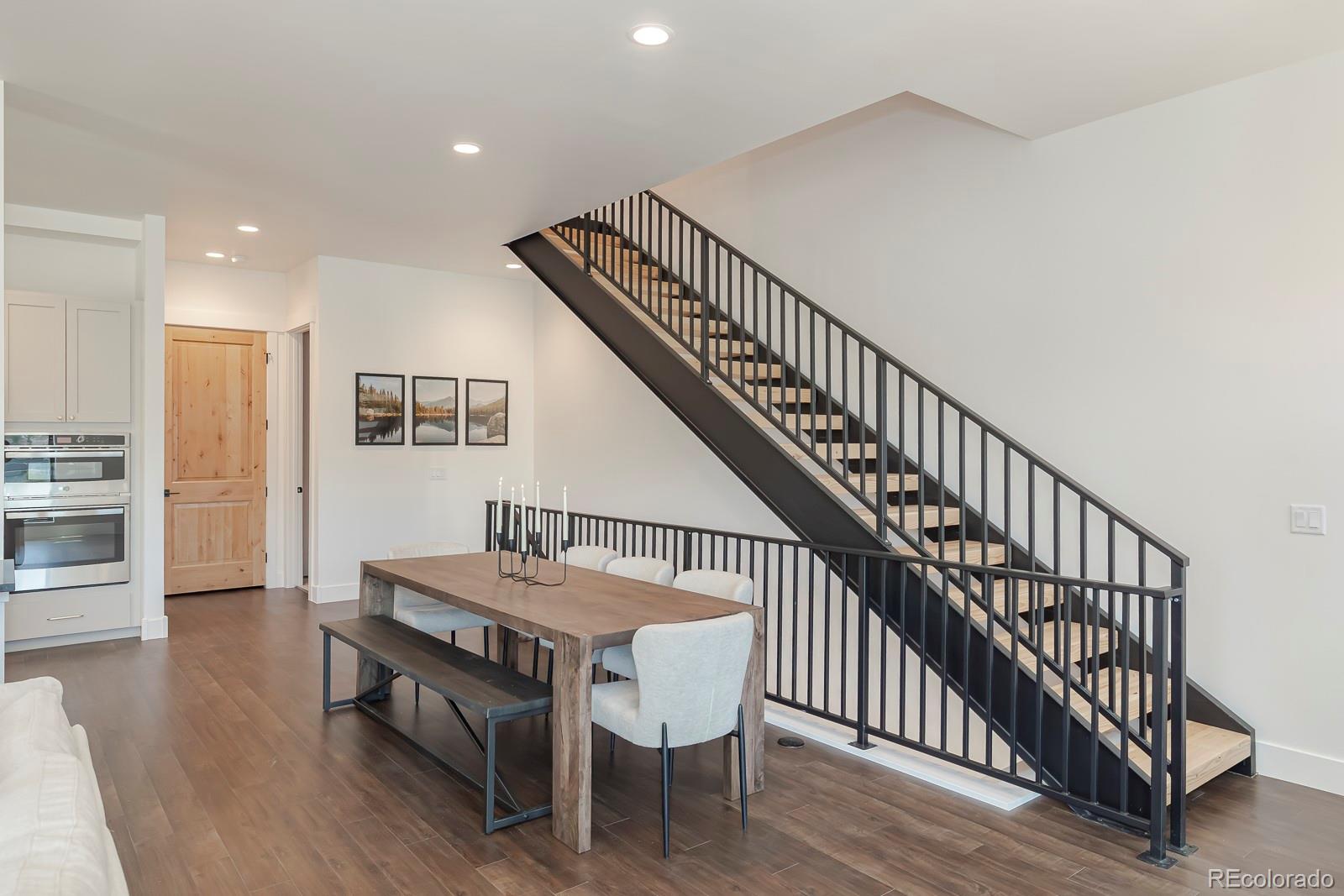 175 Whistlestop Circle Winter Park, CO 80482 - Photo 20 of 36 a room with furniture and wooden floor