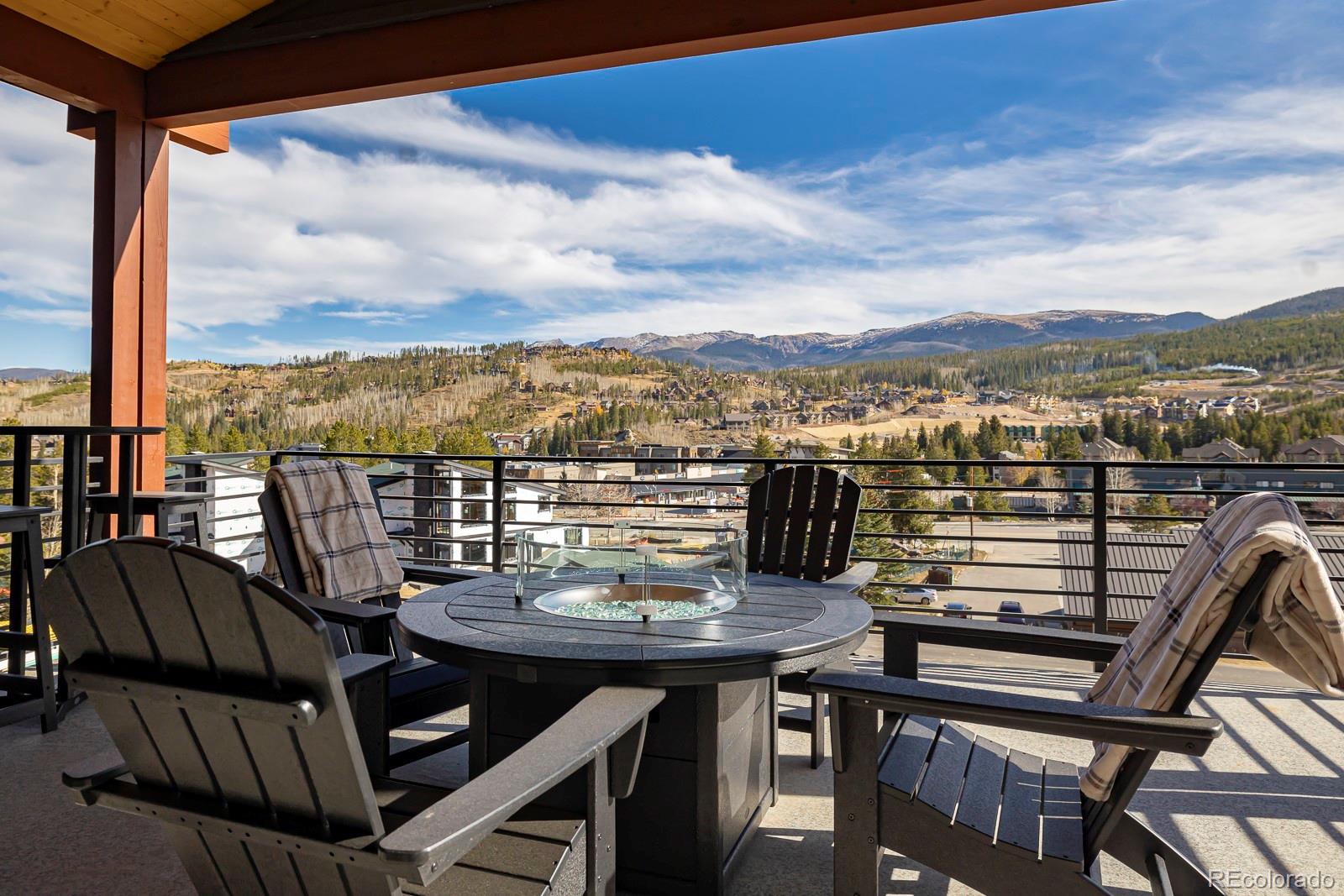 175 Whistlestop Circle Winter Park, CO 80482 - Photo 24 of 36 a view of a balcony with a table and chairs