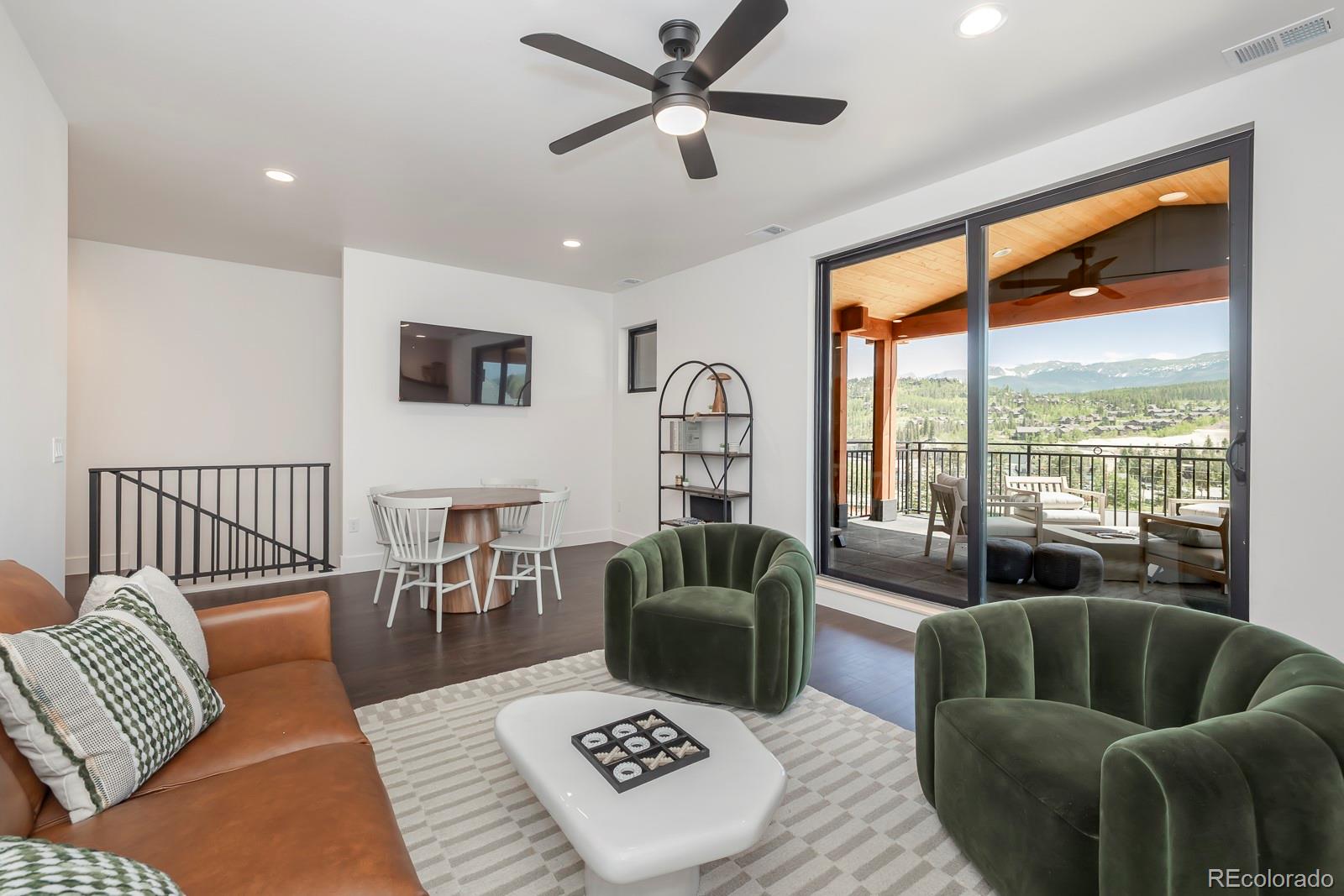 175 Whistlestop Circle Winter Park, CO 80482 - Photo 27 of 36 a living room with furniture and a large window