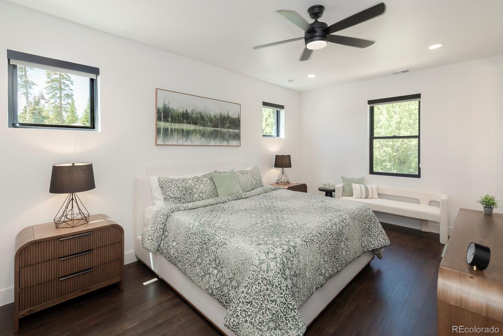 175 Whistlestop Circle Winter Park, CO 80482 - Photo 30 of 36 a bedroom with a bed and a desk