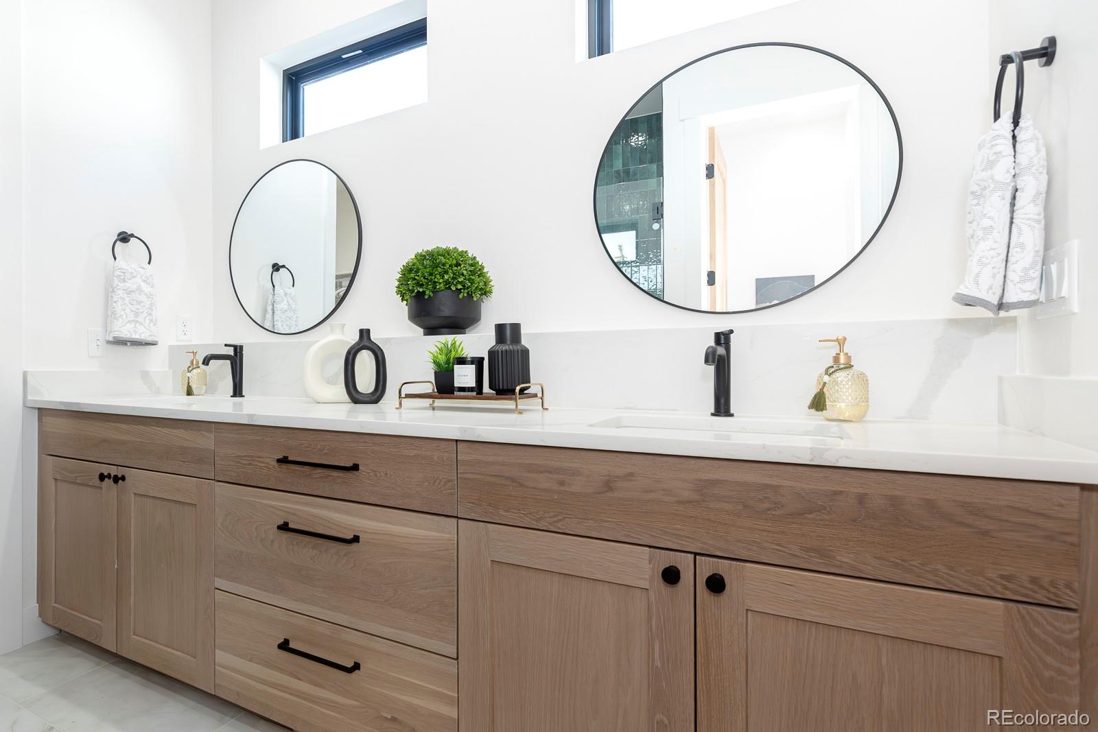 175 Whistlestop Circle Winter Park, CO 80482 - Photo 31 of 36 a bathroom with a sink and a mirror