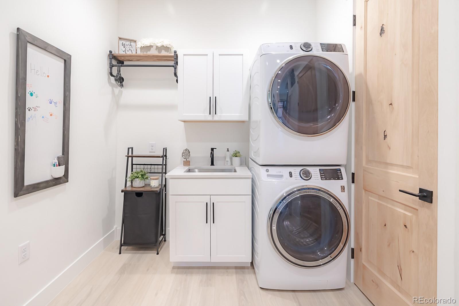 175 Whistlestop Circle Winter Park, CO 80482 - Photo 36 of 36 a utility room with dryer and washer