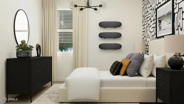 a bedroom with a bed and a potted plant