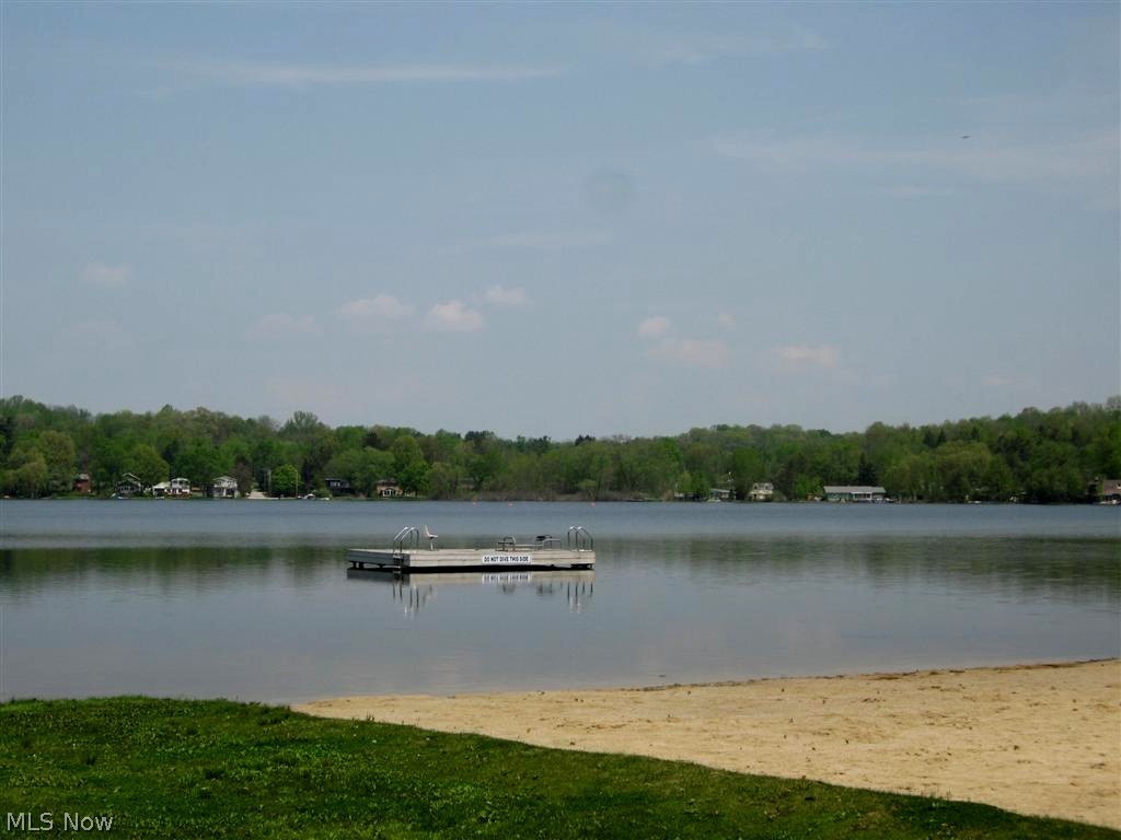 7324 Westview Road Kent, OH 44240 - Photo 26 of 28 This is Twin Lakes Lot Owner's beach. The dock is a favorite for kid play!