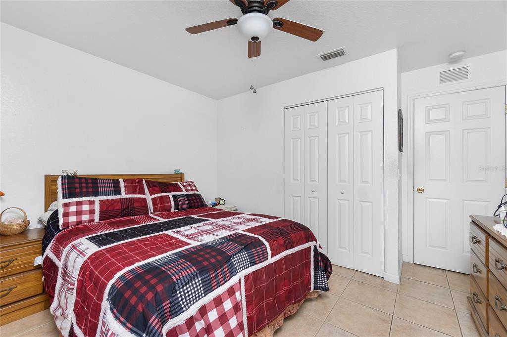 11360 Baggot Avenue Englewood, FL 34224 - Photo 23 of 31 a bedroom with a bed and window