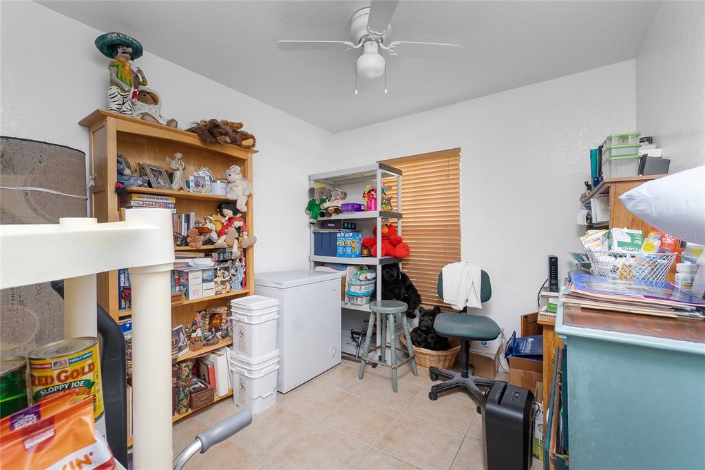 11360 Baggot Avenue Englewood, FL 34224 - Photo 26 of 31 a view of a workspace with furniture and toys