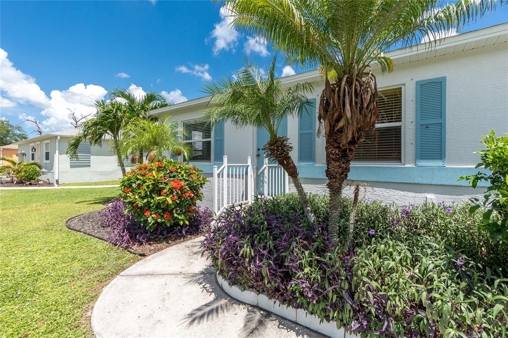 11360 Baggot Avenue Englewood, FL 34224 - Photo 3 of 31 a front view of a house with a yard