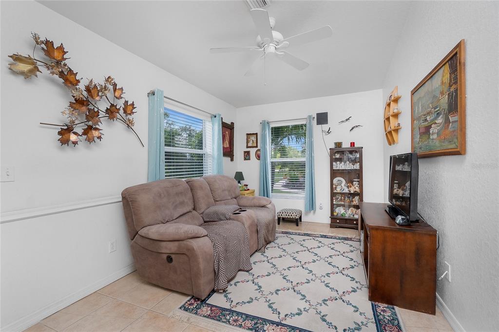 11360 Baggot Avenue Englewood, FL 34224 - Photo 5 of 31 a living room with furniture and a window