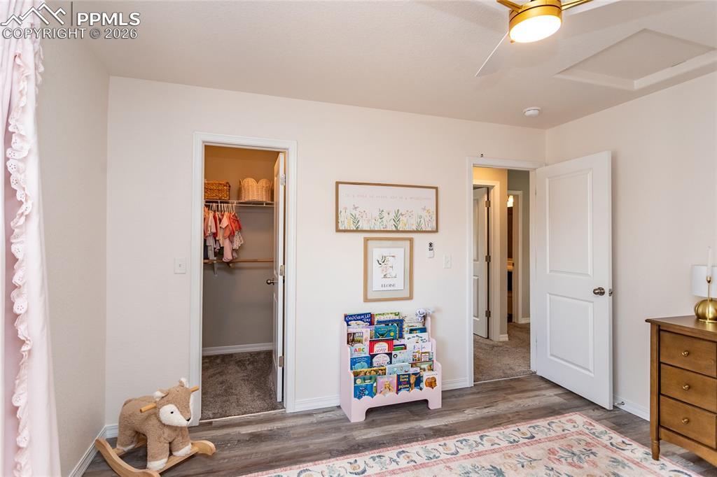 7751 Berwyn Loop Peyton, CO 80831 - Photo 29 of 50 a living room with furniture and wooden floor