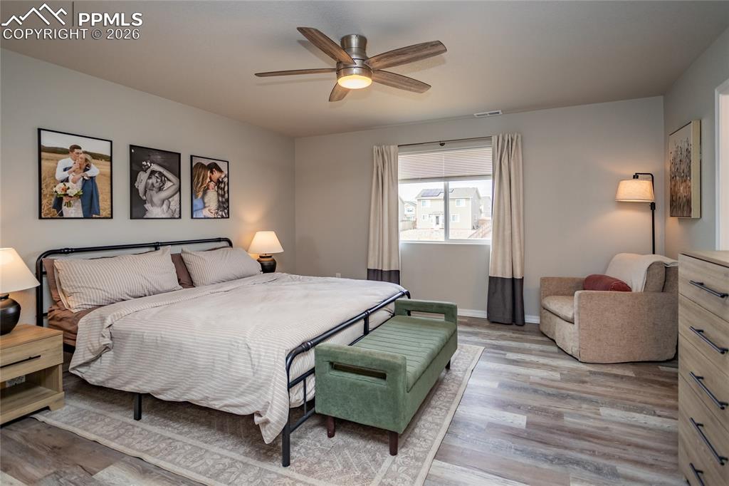 7751 Berwyn Loop Peyton, CO 80831 - Photo 37 of 50 a bedroom with bed and window