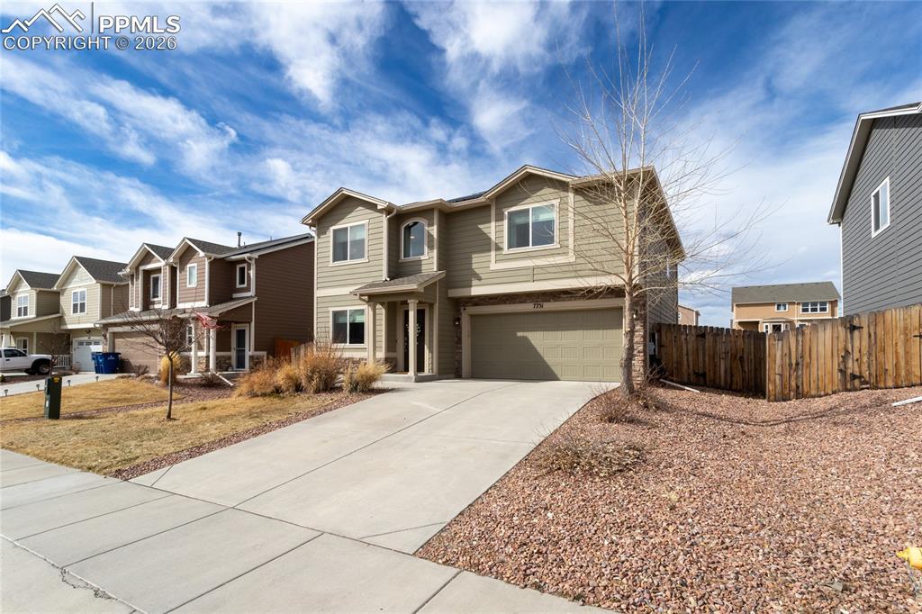 7751 Berwyn Loop Peyton, CO 80831 - Photo 4 of 50 a view of a house with a roof deck
