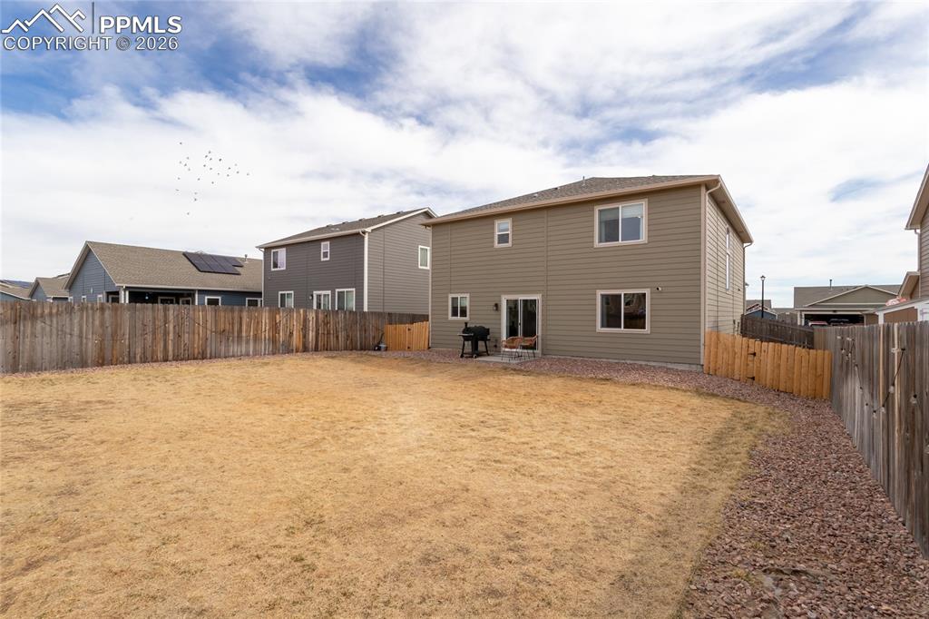 7751 Berwyn Loop Peyton, CO 80831 - Photo 47 of 50 a view of a backyard