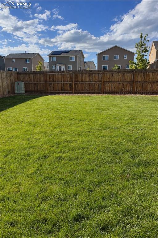 7751 Berwyn Loop Peyton, CO 80831 - Photo 49 of 50 a view of a large yard with a large trees
