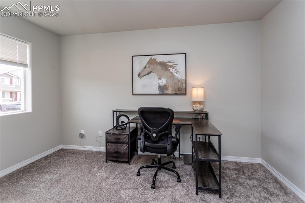 7751 Berwyn Loop Peyton, CO 80831 - Photo 7 of 50 a view of workspace with a window