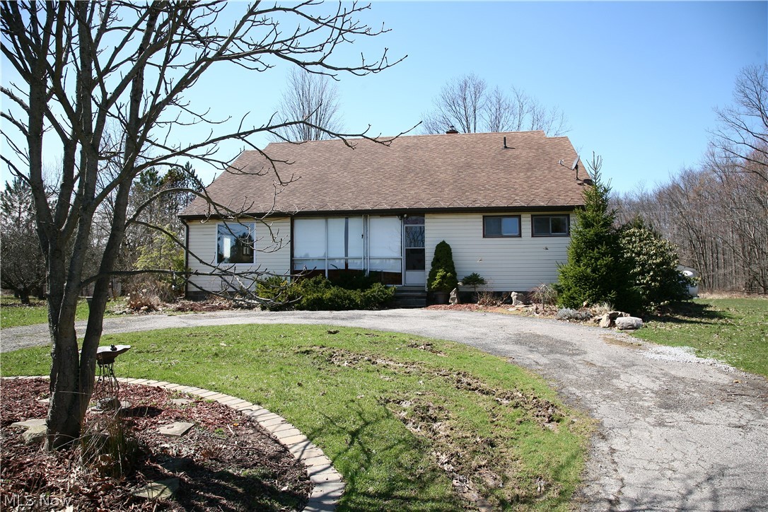 9150 Williams Road Chardon, OH 44024 - Photo 1 of 32 9150 Williams Road, circular drive in front of home