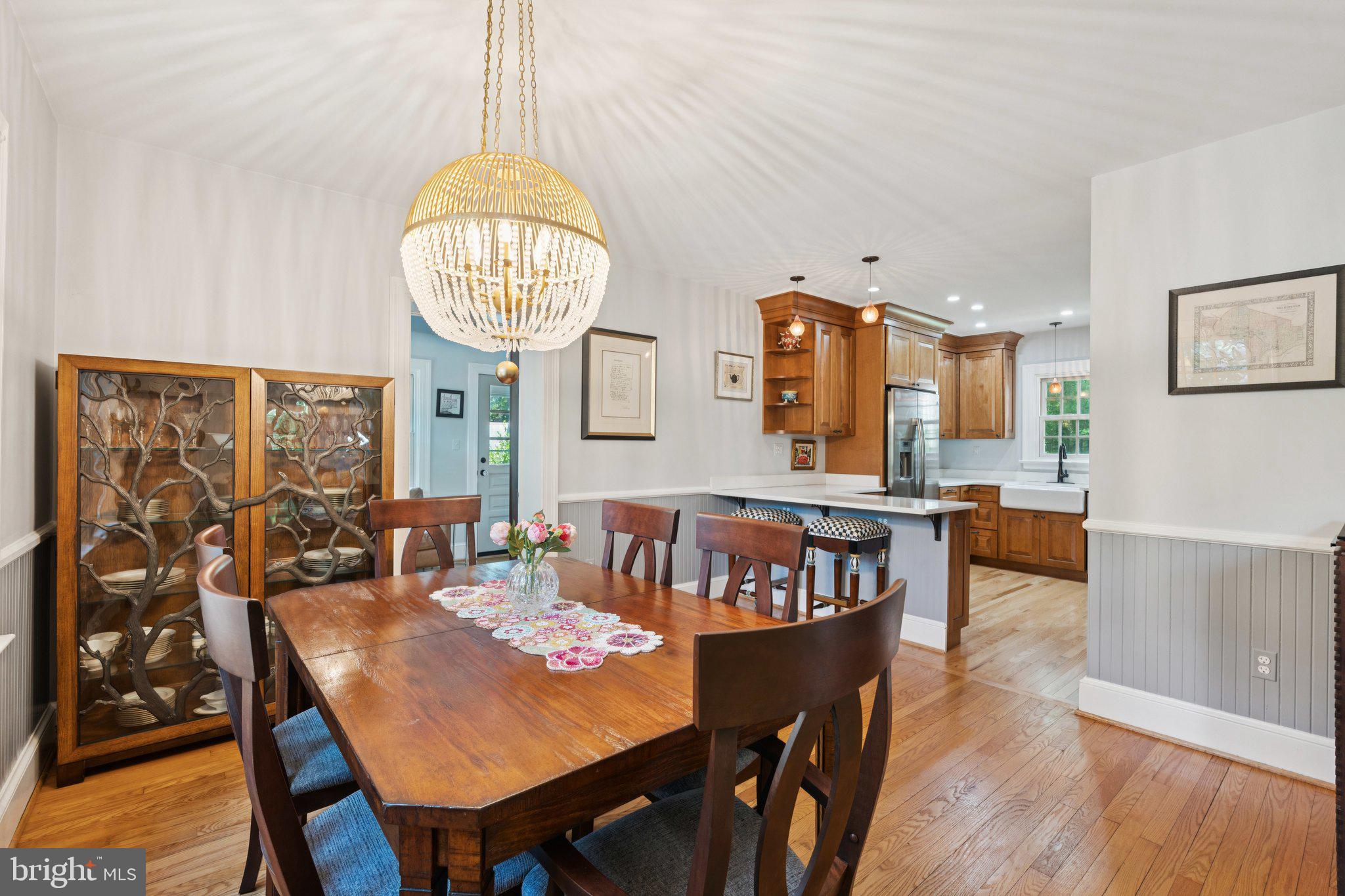 3666 Military Road Arlington, VA 22207 - Photo 13 of 69 a view of a dining room with furniture and wooden floor