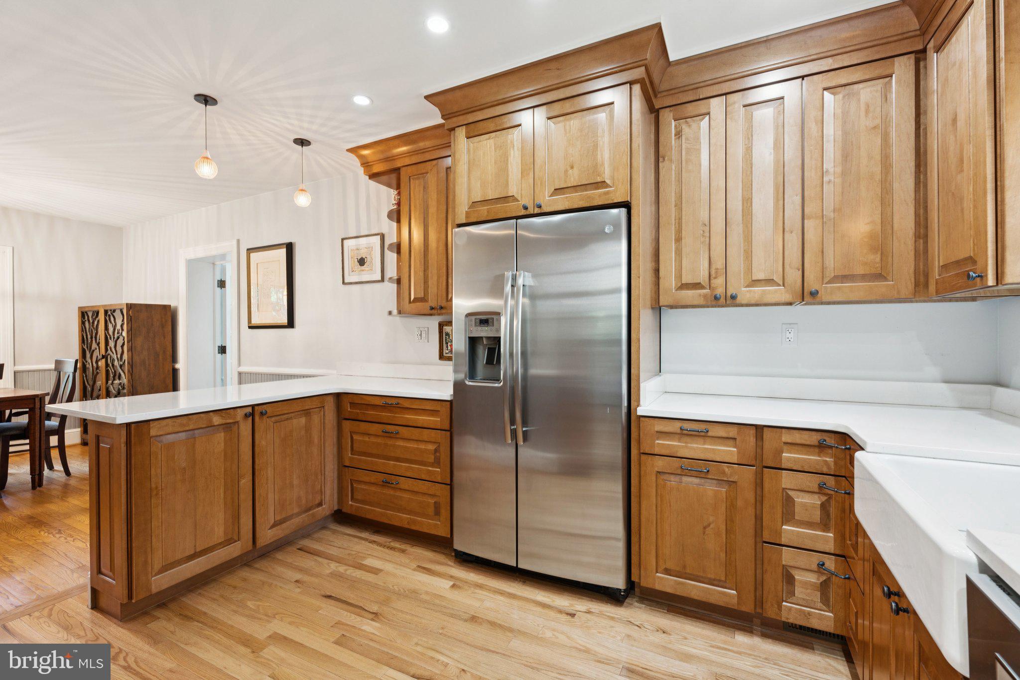 3666 Military Road Arlington, VA 22207 - Photo 18 of 69 a kitchen with stainless steel appliances granite countertop a refrigerator and a sink