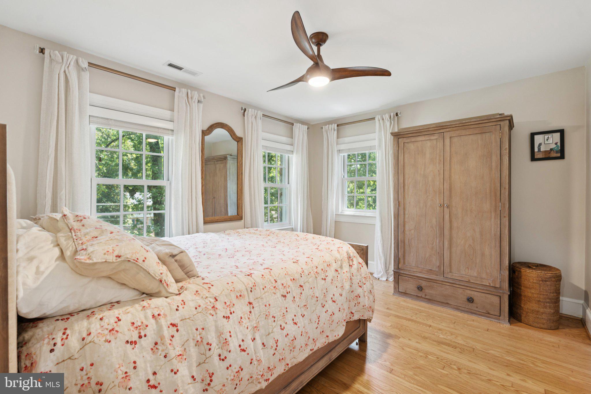 3666 Military Road Arlington, VA 22207 - Photo 23 of 69 a bedroom with a large bed and a large window