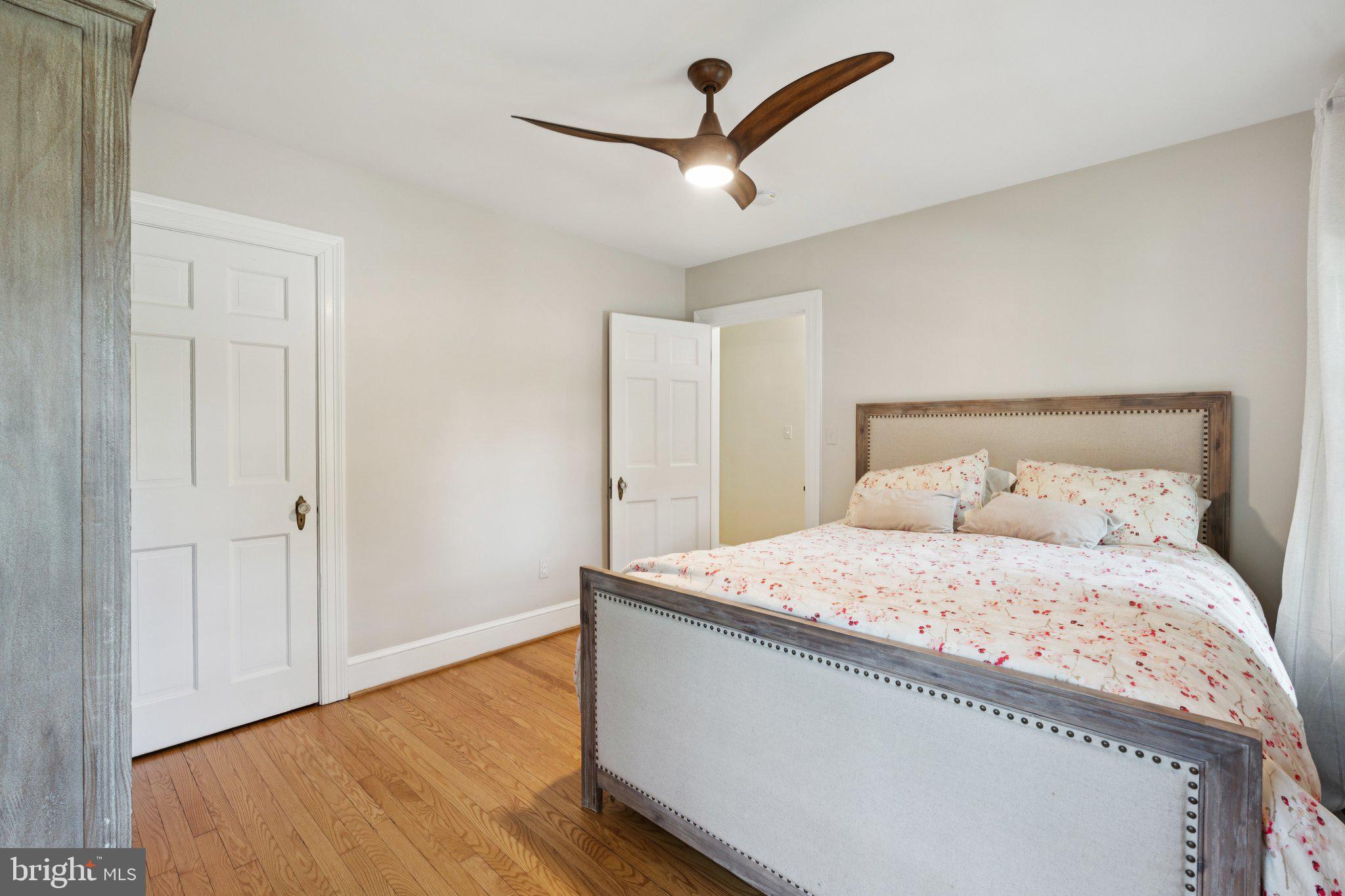 3666 Military Road Arlington, VA 22207 - Photo 24 of 69 a bedroom with a bed and a ceiling fan