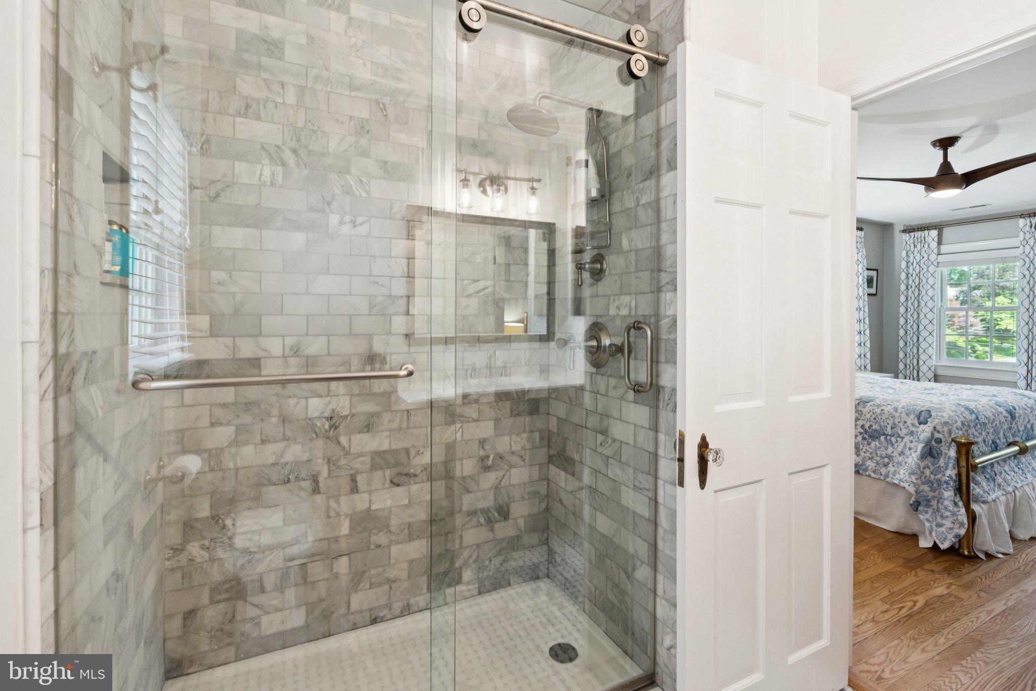 3666 Military Road Arlington, VA 22207 - Photo 31 of 69 a bathroom with a glass shower door