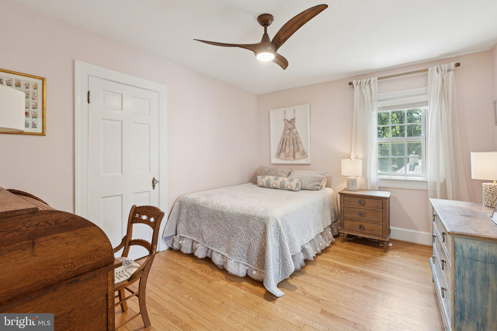 3666 Military Road Arlington, VA 22207 - Photo 32 of 69 a bedroom with a bed and wooden floor