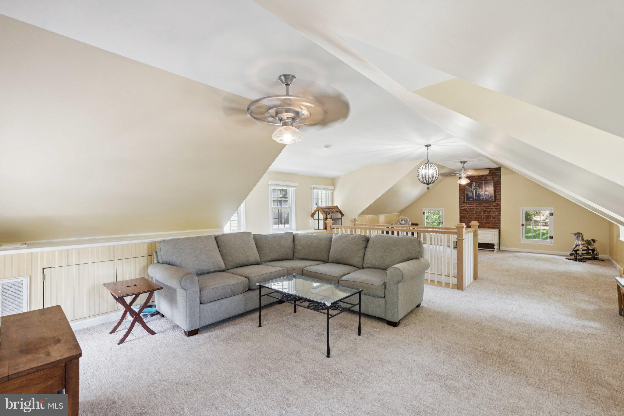 3666 Military Road Arlington, VA 22207 - Photo 36 of 69 a living room with furniture and a chandelier