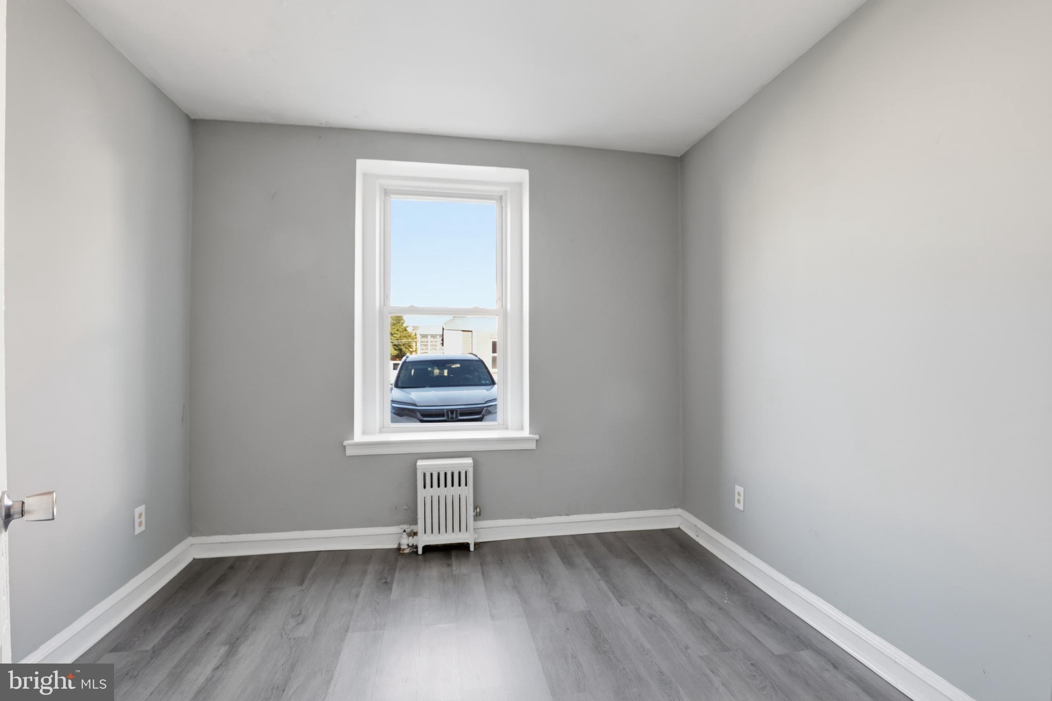 831 North 10th Street Reading, PA 19604 - Photo 13 of 33 an empty room with a window