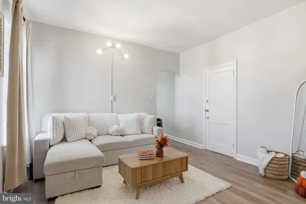 a living room with furniture and a couch