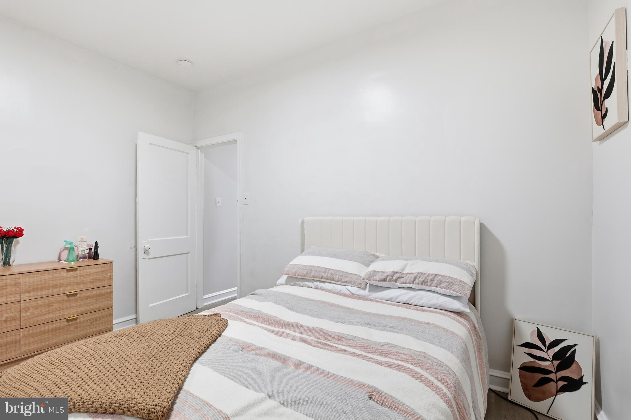 831 North 10th Street Reading, PA 19604 - Photo 30 of 33 a bedroom with a bed and a cabinets