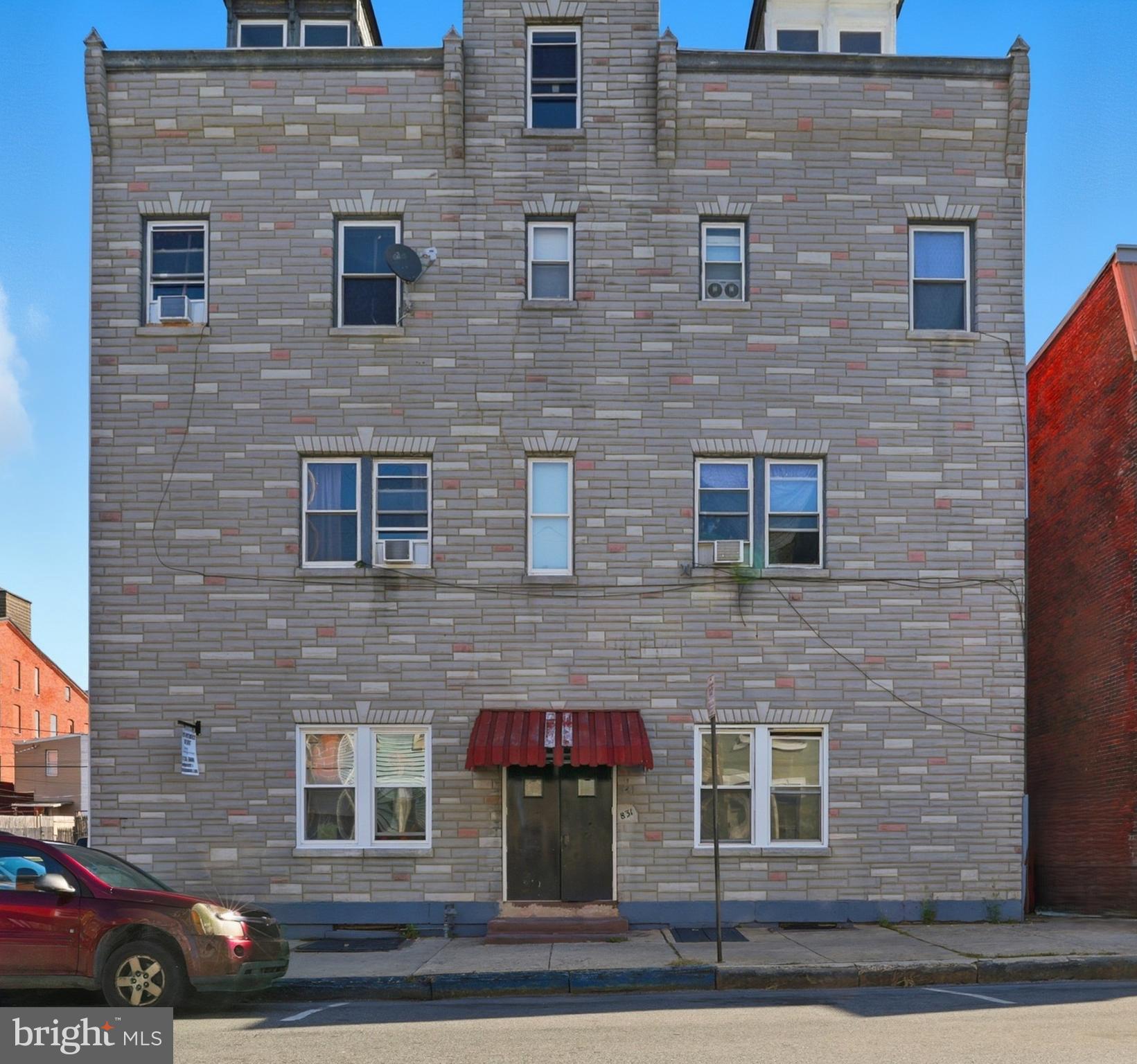 831 North 10th Street Reading, PA 19604 - Photo 4 of 33 a building with multiple windows