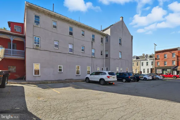 a cars parked in front of a building