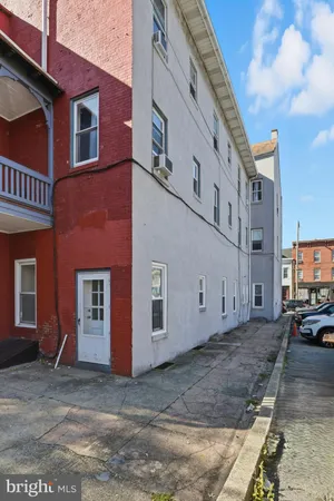 a view of a building with a street