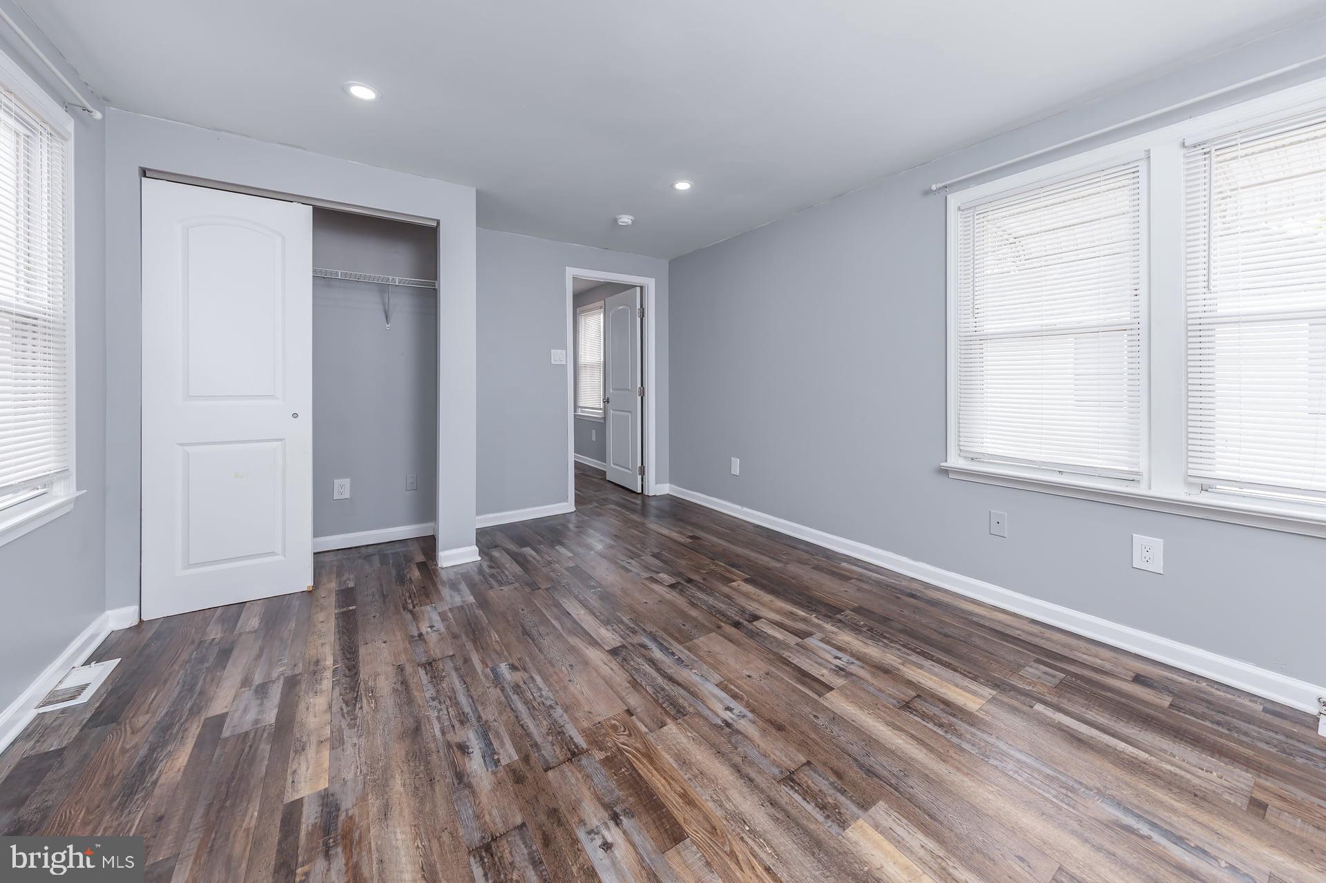 277 South River Walk Penns Grove, NJ 08069 - Photo 10 of 13 wooden floor in an empty room with a window