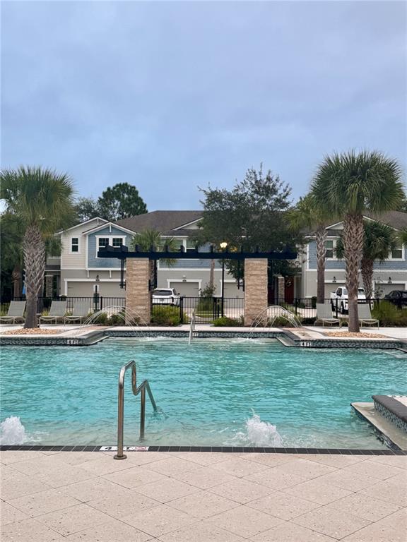 17841 Althea Blue Place Lutz, FL 33558 - Photo 35 of 38 a swimming pool view with a outdoor seating