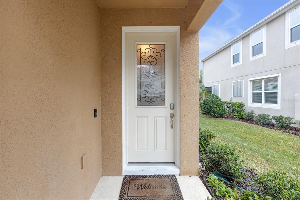 17841 Althea Blue Place Lutz, FL 33558 - Photo 5 of 38 a view of front door of house