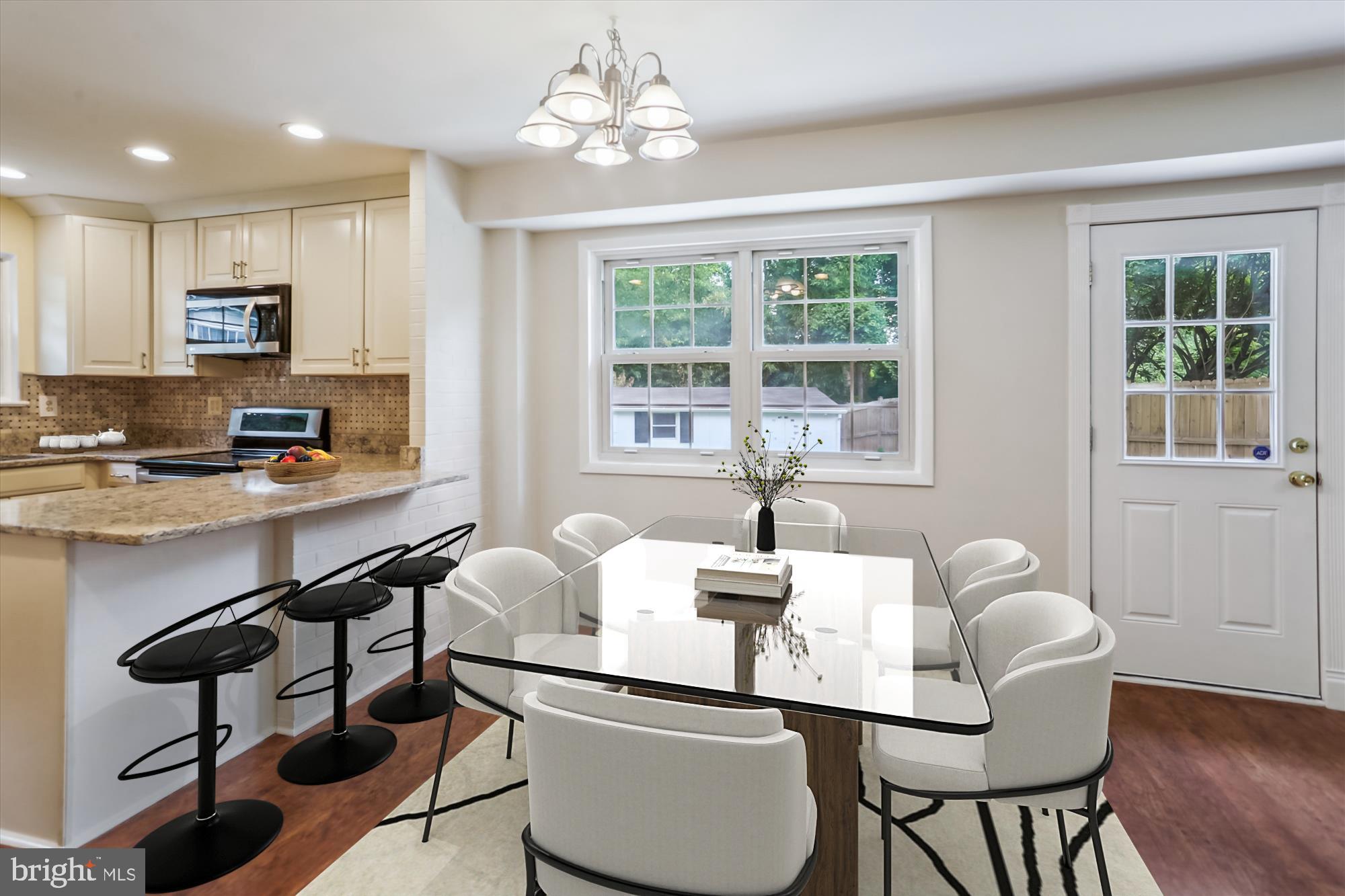 3909 Woodlawn Road Chevy Chase, MD 20815 - Photo 18 of 54 a very nice looking dining room with furniture window and wooden floor
