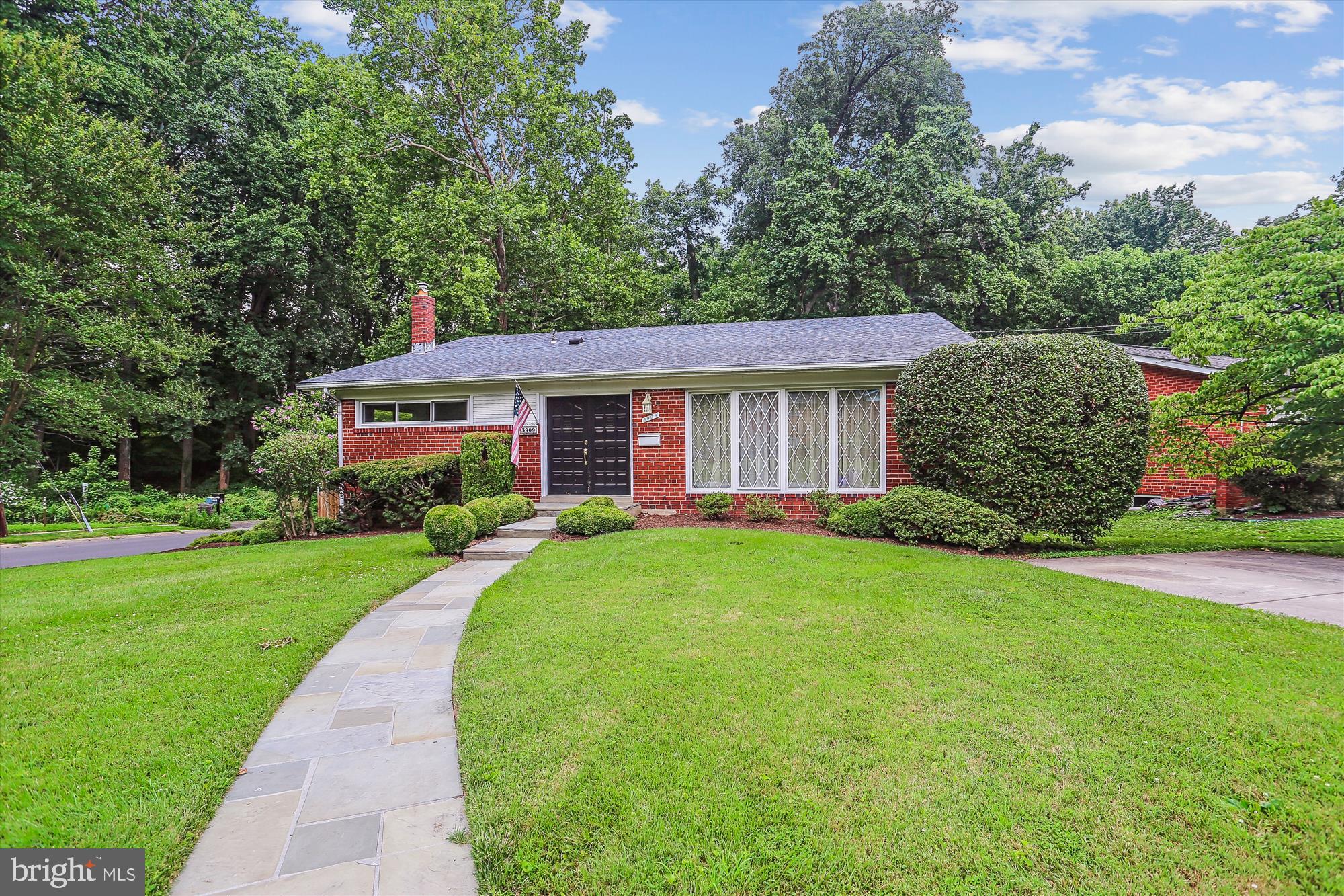 3909 Woodlawn Road Chevy Chase, MD 20815 - Photo 2 of 54 a view of a house with a yard