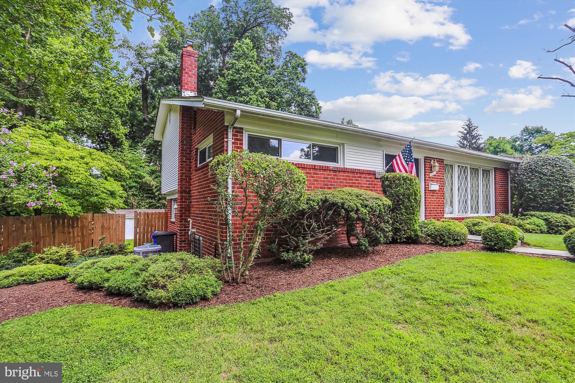 3909 Woodlawn Road Chevy Chase, MD 20815 - Photo 3 of 54 a front view of a house with garden