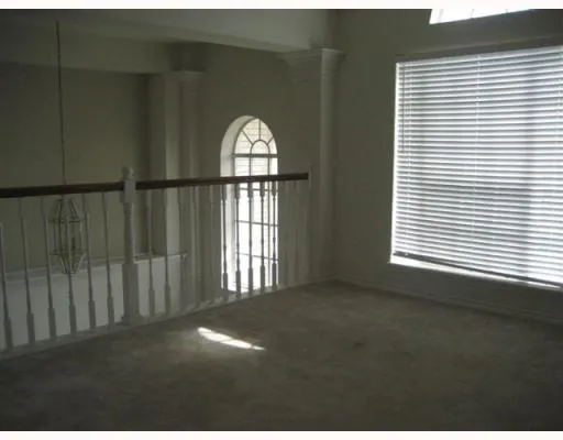 a view of empty room with a window
