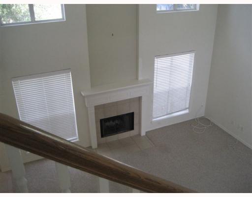 7405 Prairie Drive Corpus Christi, TX 78413 - Photo 7 of 7 a view of an empty room with wooden floor and a window