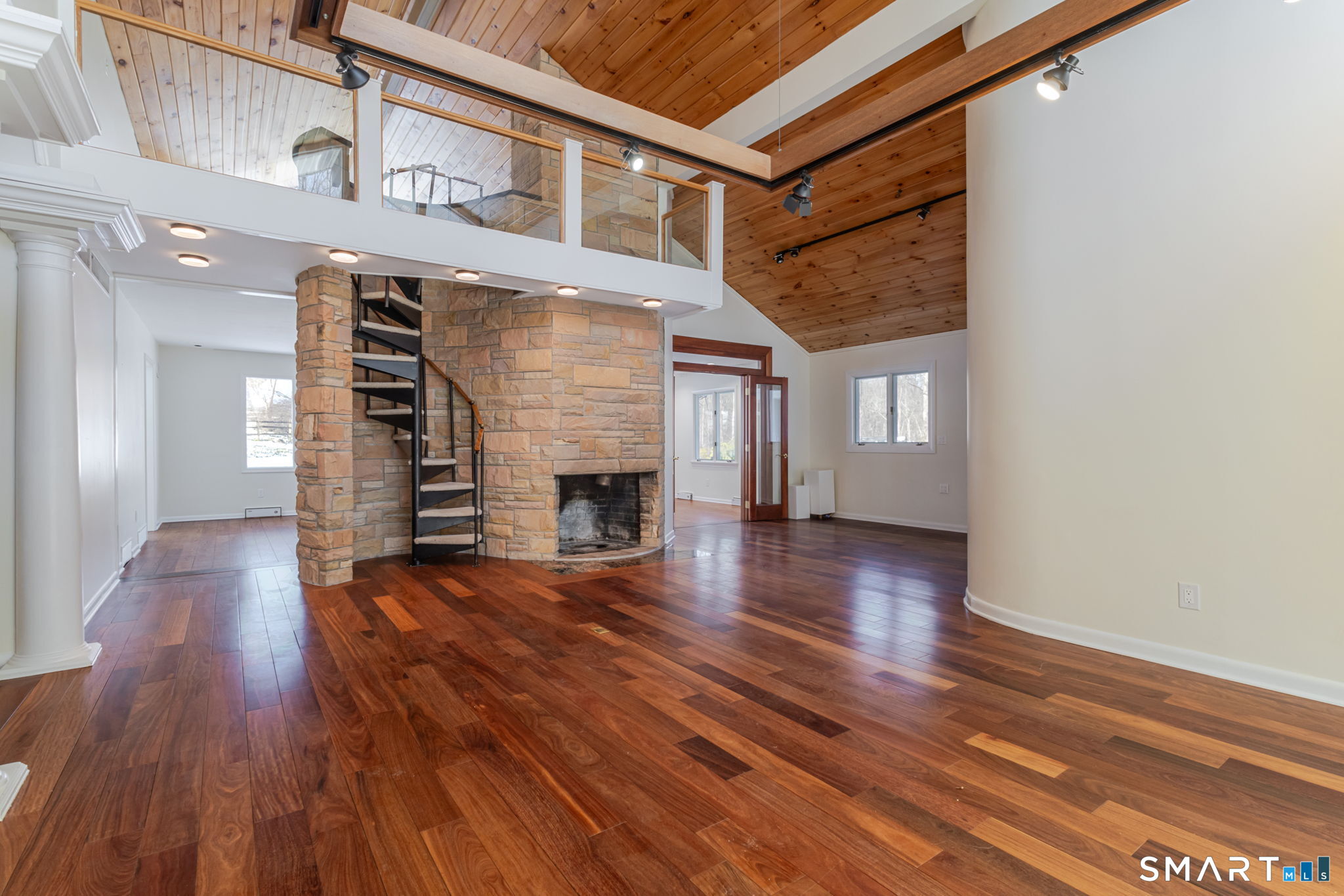 5 Mohawk Lane Woodbridge, CT 06525 - Photo 16 of 48 GREAT ROOM WITH CHERRY FLOORING AND STUNNING STONE FIREPLACE
