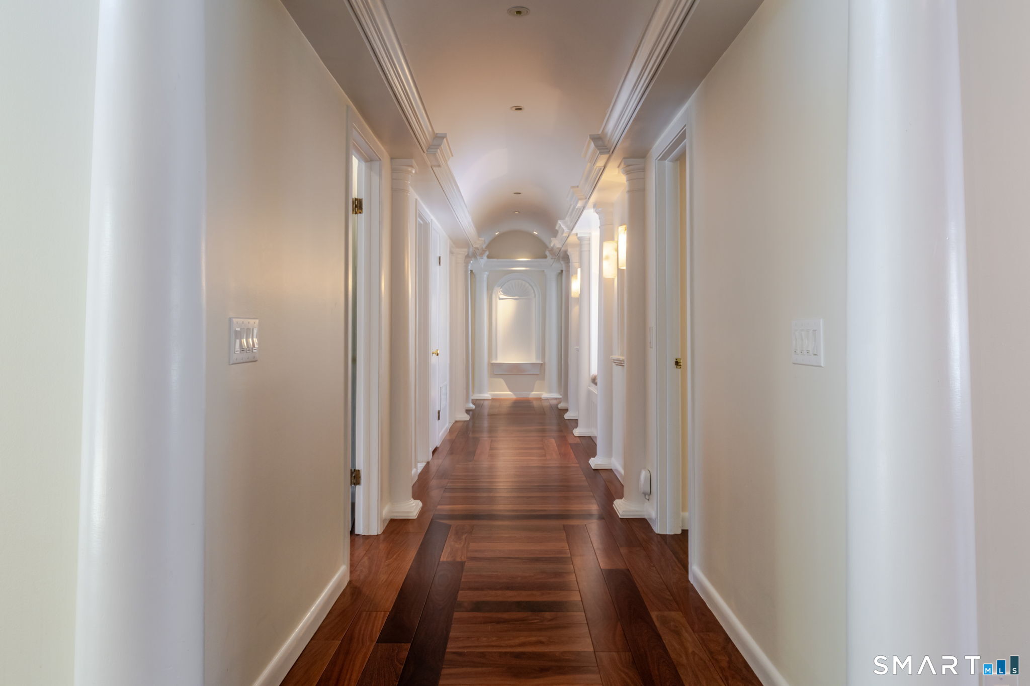 5 Mohawk Lane Woodbridge, CT 06525 - Photo 33 of 48 GORGEOUS BEDROOM HALL WAY WITH DOMED CEILING, CUSTOM TRIM AND MILL WORK AND A BUILT IN BENCH