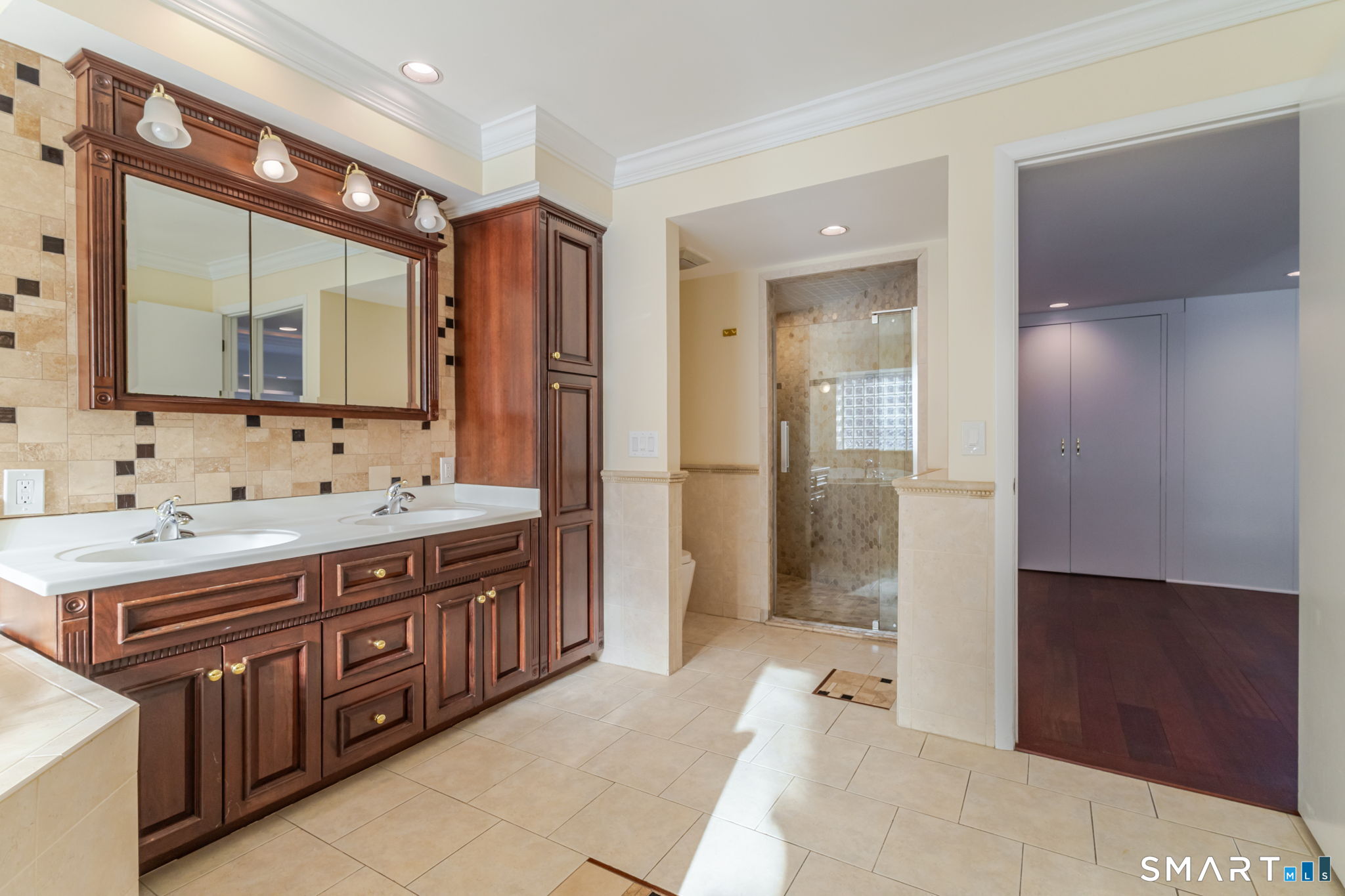 5 Mohawk Lane Woodbridge, CT 06525 - Photo 42 of 48 PRIMARY BATH WITH WHIRLPOOL TUB AND STEAM SHOWER