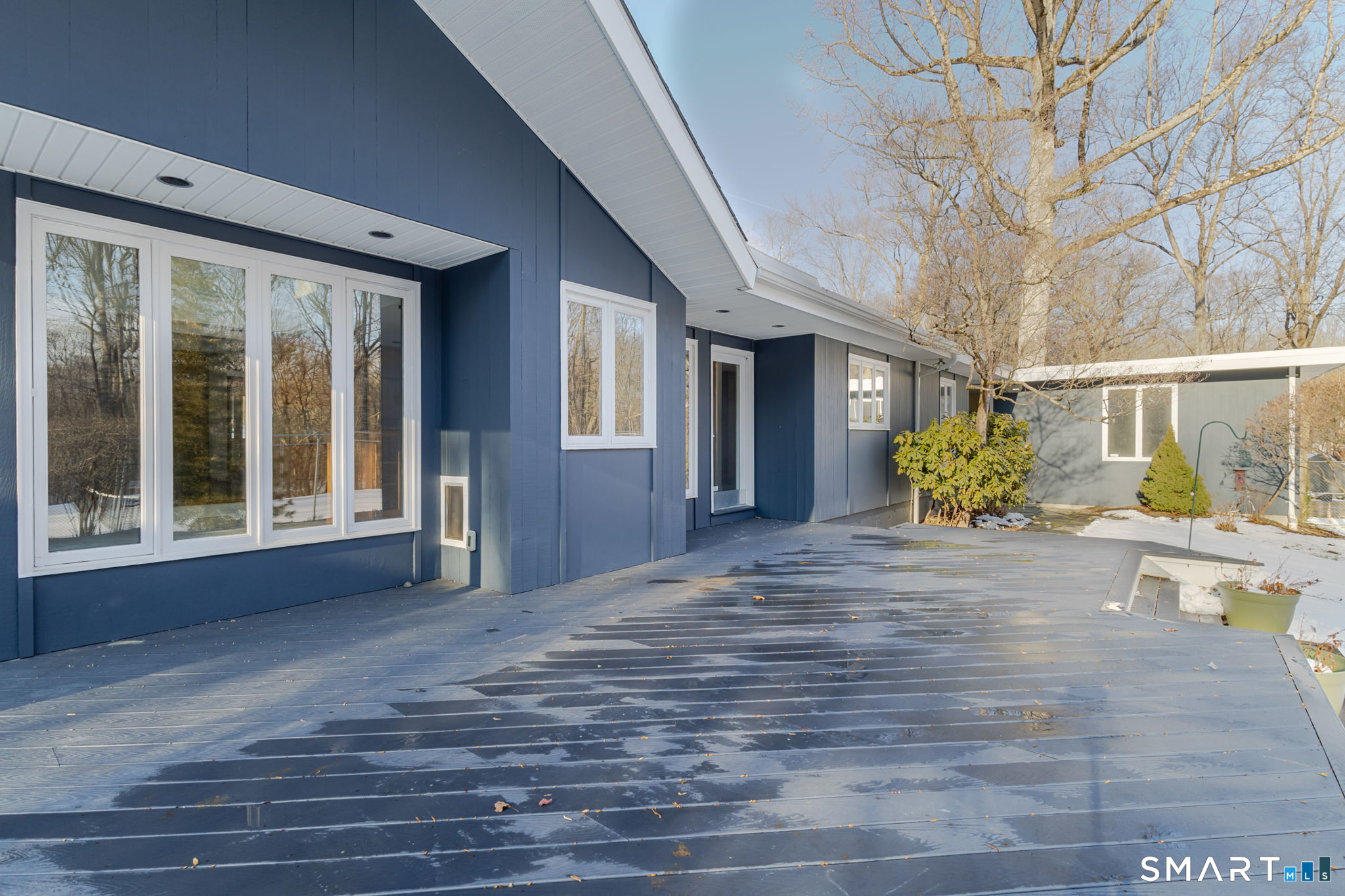 5 Mohawk Lane Woodbridge, CT 06525 - Photo 47 of 48 WRAP AROUND TREX STYLE DECK OFF KITCHEN