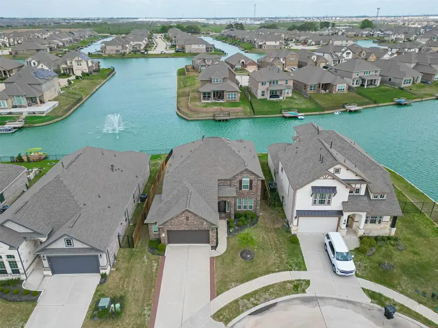 an aerial view of a house with a outdoor space
