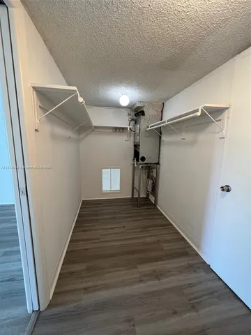 a view of a walk in closet