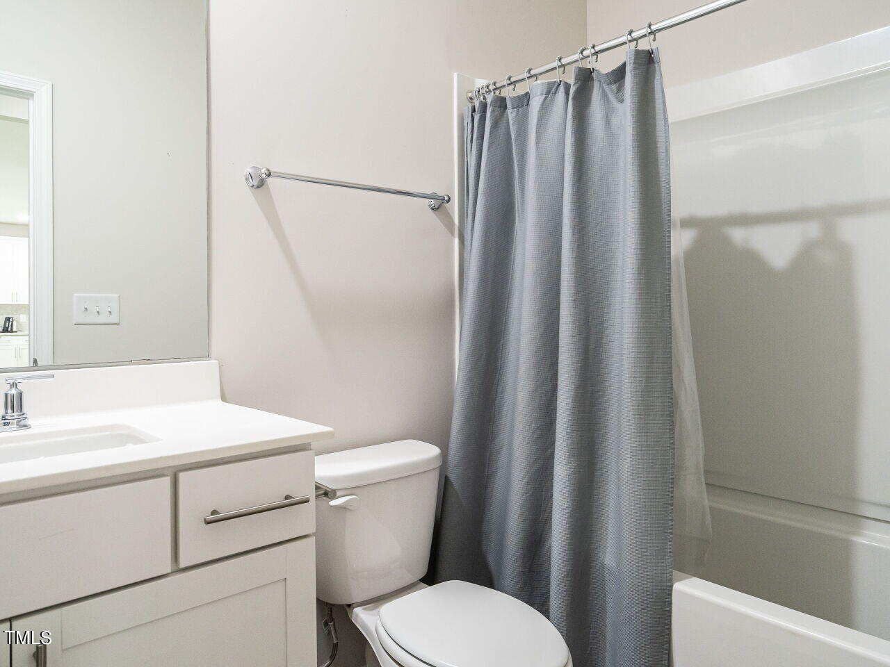 633 Embrun Run Wendell, NC 27591 - Photo 15 of 32 a white toilet sitting next to a bathroom sink