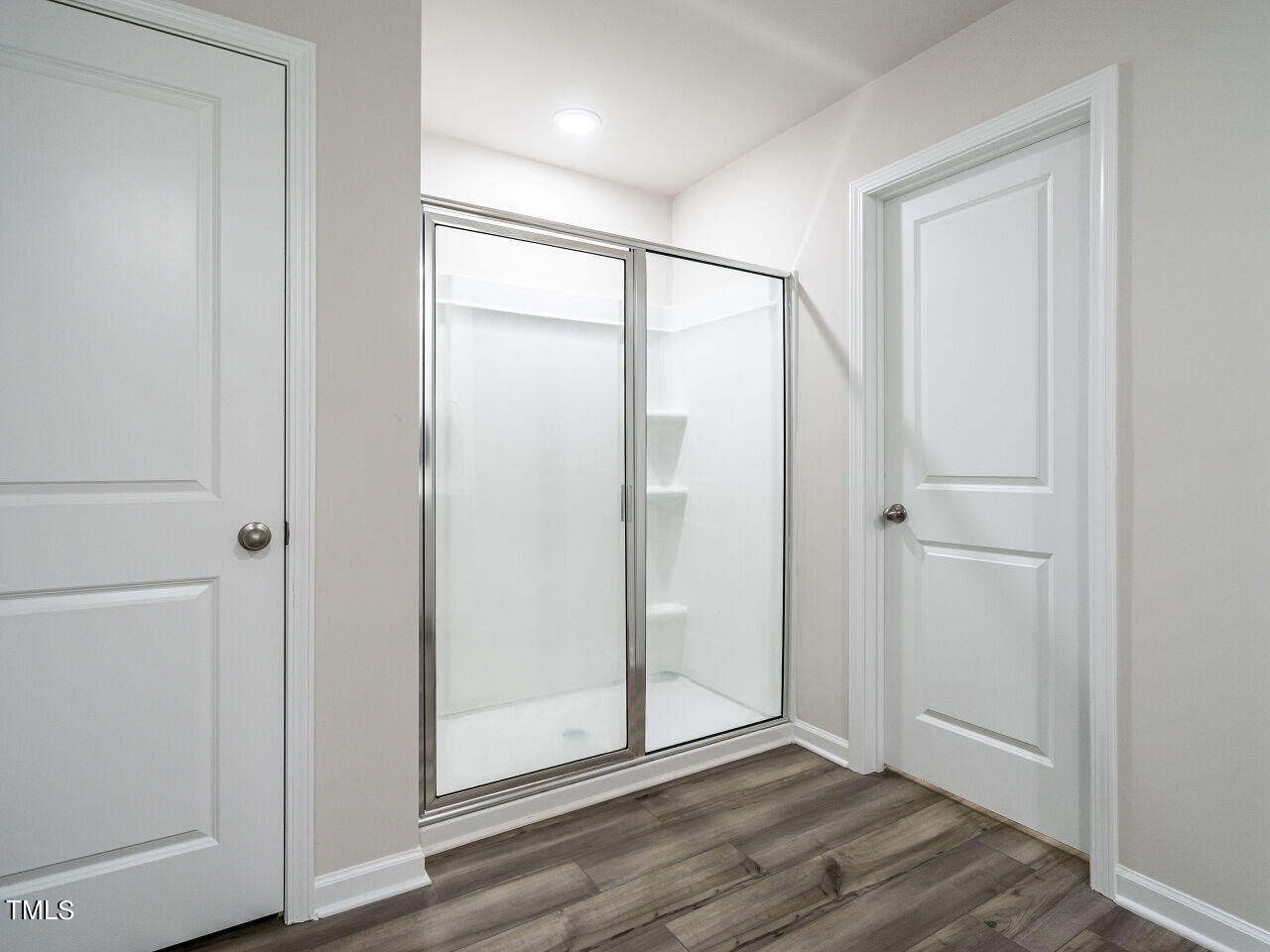 633 Embrun Run Wendell, NC 27591 - Photo 20 of 32 a view of an empty room with wooden floor and closet