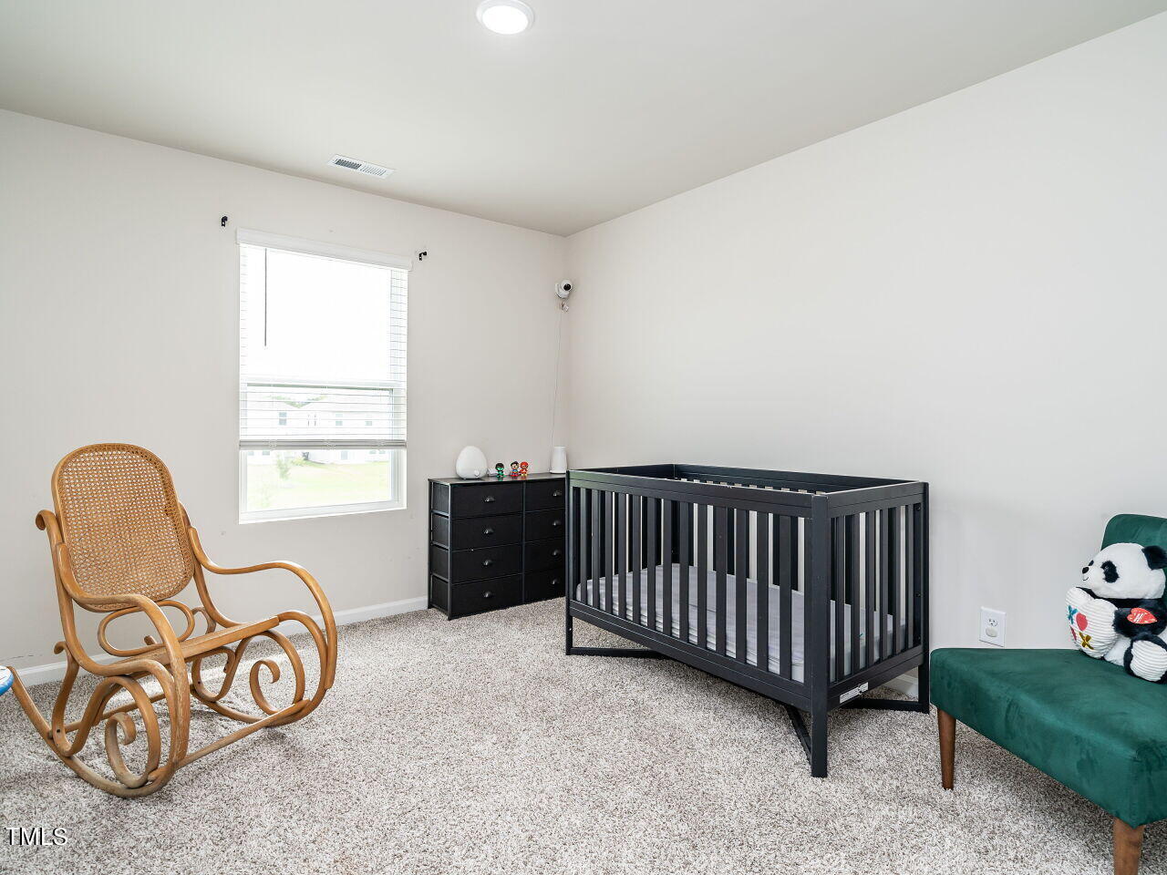 633 Embrun Run Wendell, NC 27591 - Photo 21 of 32 a view of a room with furniture window and wooden floor