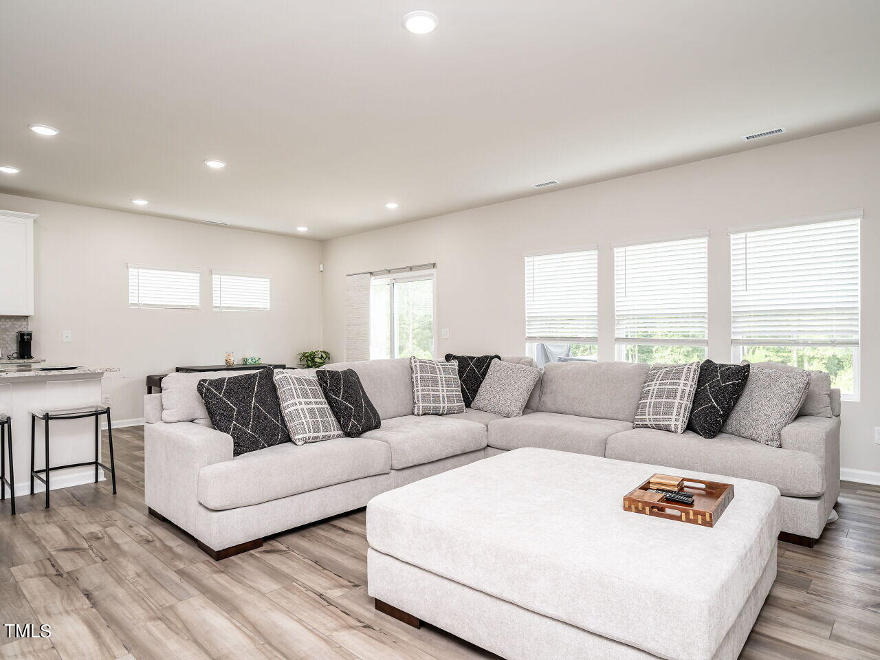 633 Embrun Run Wendell, NC 27591 - Photo 7 of 32 a living room with furniture and a large window